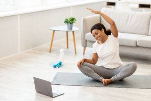 Woman exercising from home
